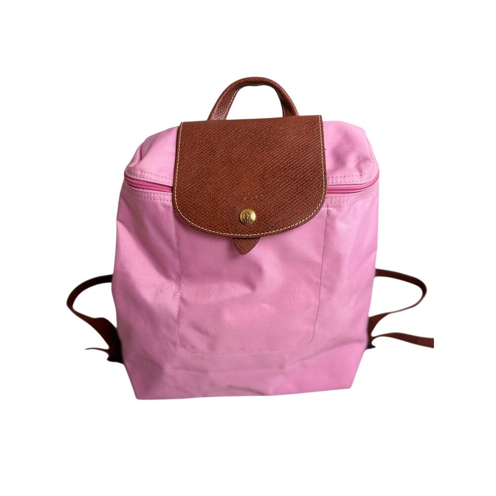 Longchamp Le Pliage pink nylon backpack tan leather flap gold tone hardware zips